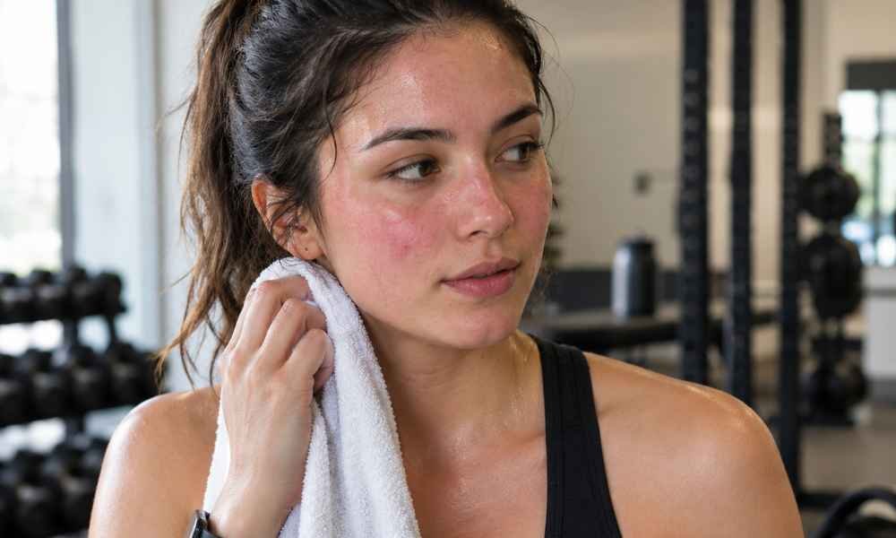 a woman looking tired after workout